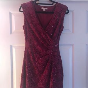 Sequined magenta bridesmaid dress.